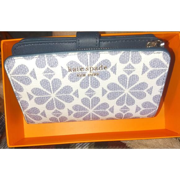 kate spade Handbags - Kate Spade Flower Wallet in Coated Canvas Never Used w/box